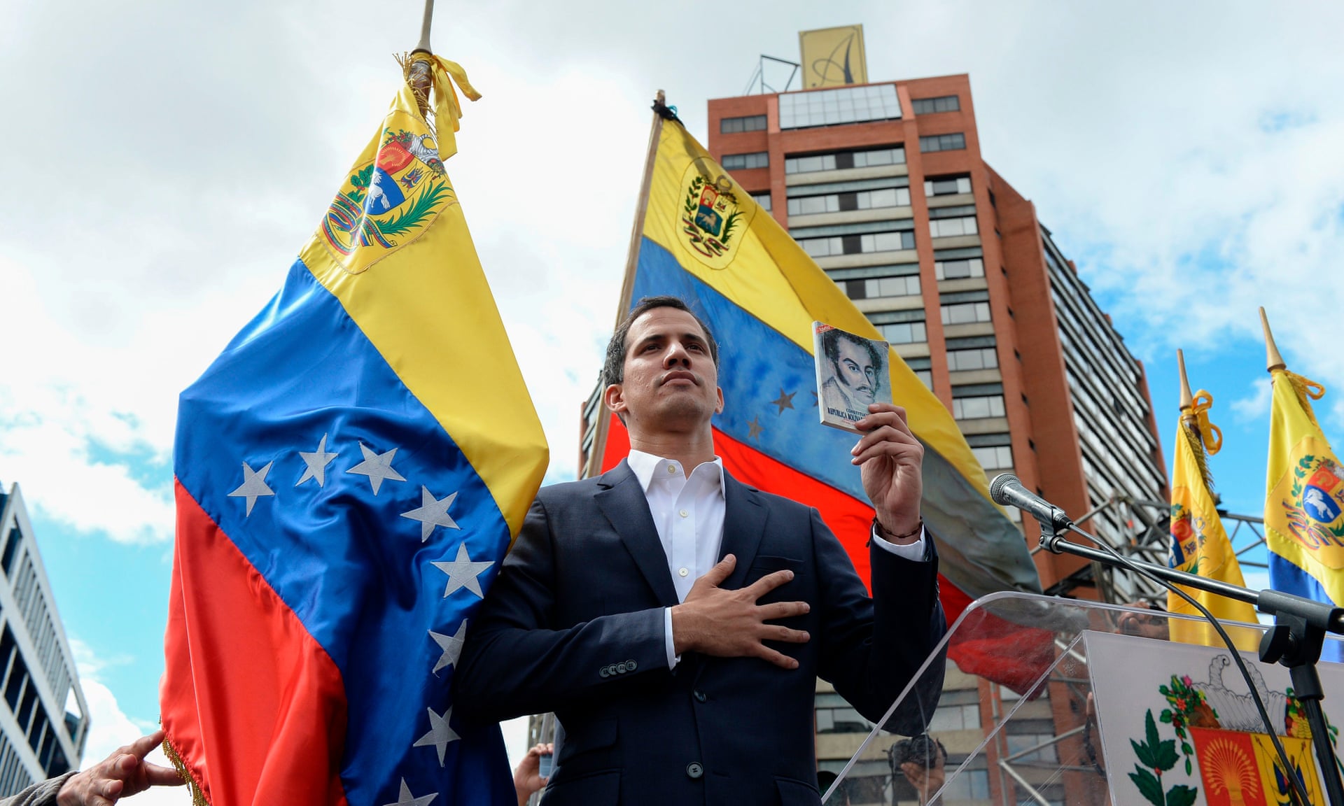 Juan Guaidó declares himself the country’s ‘acting president’ during a rally on Wednesday