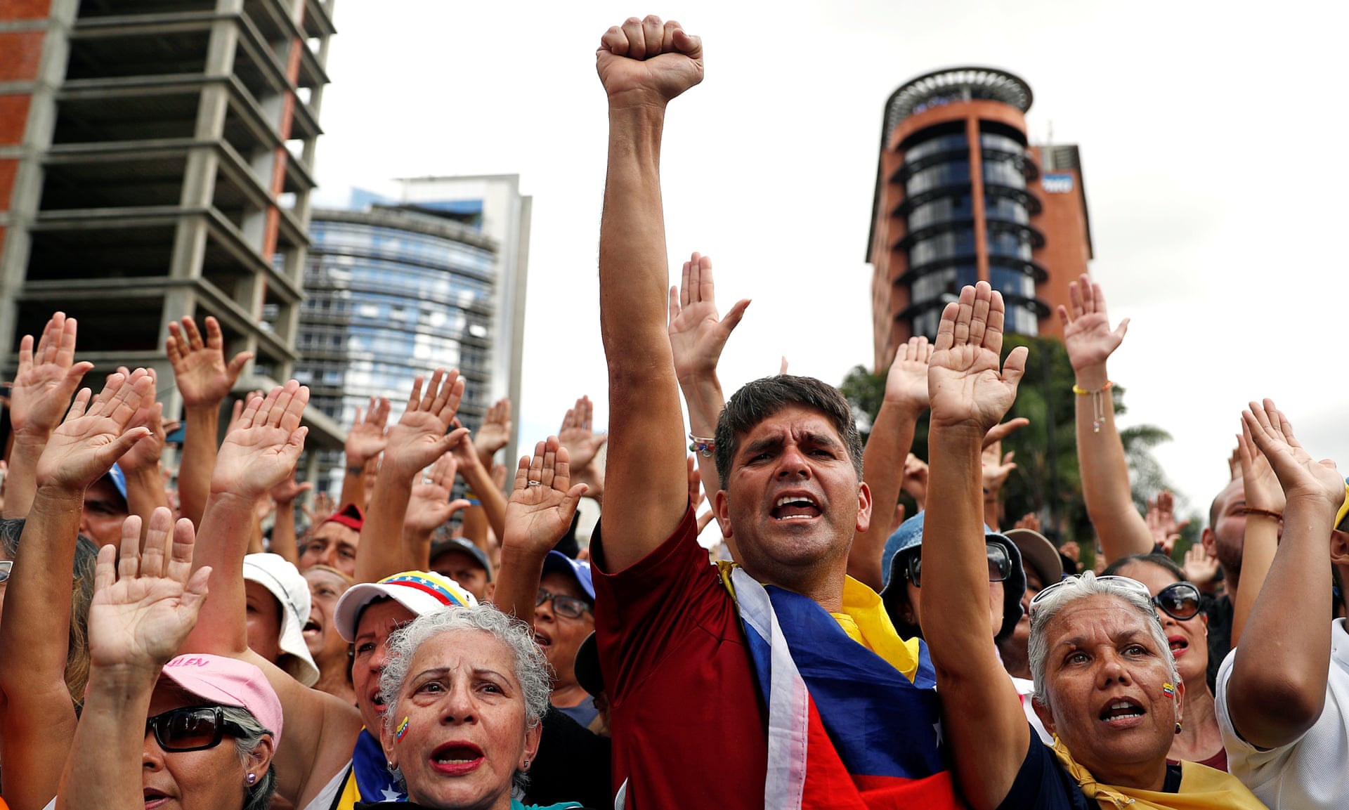 Opposition supporters react during a rally against President Nicolás Maduro’s government in Caracas on Wednesday